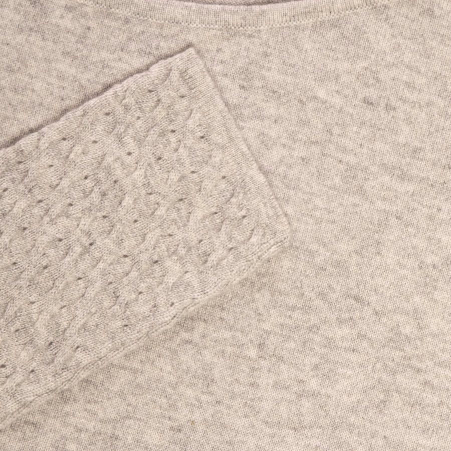 Close-up of Grey Jewel Asymmetric Top