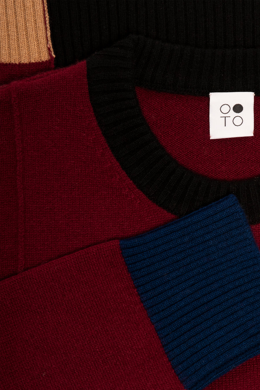 Close up of Wine Onyx Crew Neck Sweater